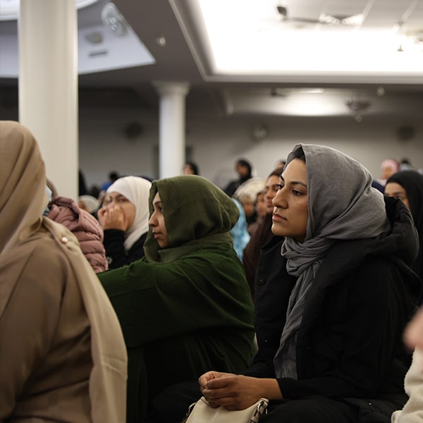 Muslim women sitting in a mosque